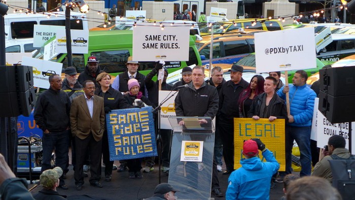 1024px-Uber_Protest_Portland_(15655460313).jpg