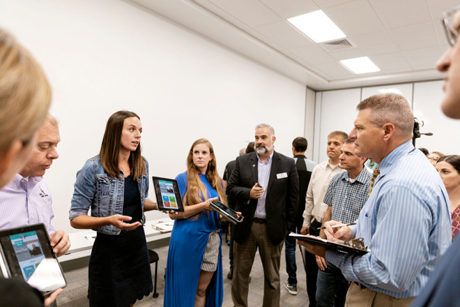32284-55085-Apple-Teacher-Coding-Academies-Boise-Police-Chief-Bill-Bones-listens-to-presentation-08072019-l.jpg