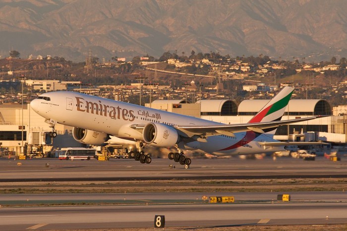 Emirates_A6-EWA_Boeing_777-200LR_taking_off_from_LAX_(5222343985).jpg