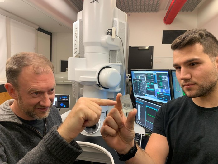 1Scientists-With-Ureilite-Meteor-Sample-scaled.jpg