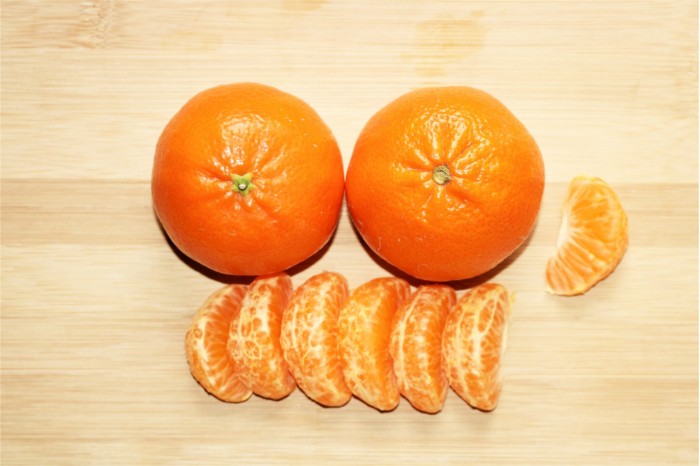 two-oranges-and-segments.jpg